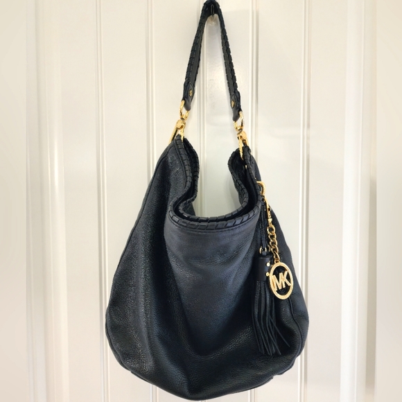 Classic black Michael Kors handbag with tassels and MK charm - Picture 2 of 5